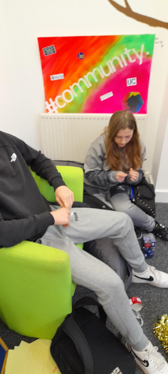 Young people decorating the House Project at Christmas